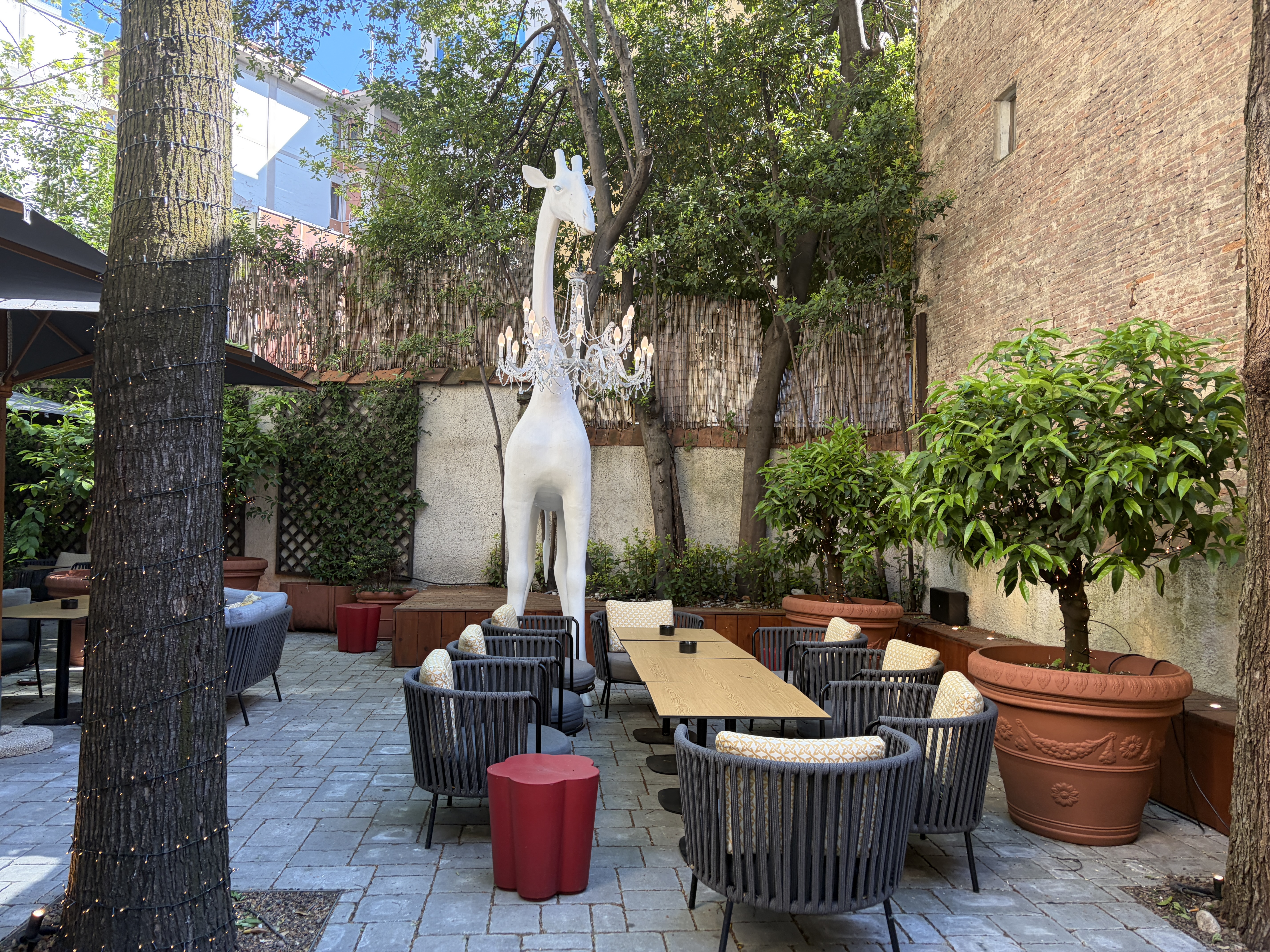 backyard-seating-at-the-hotel-indigo-florence Backyard seating at the Hotel Indigo Florence