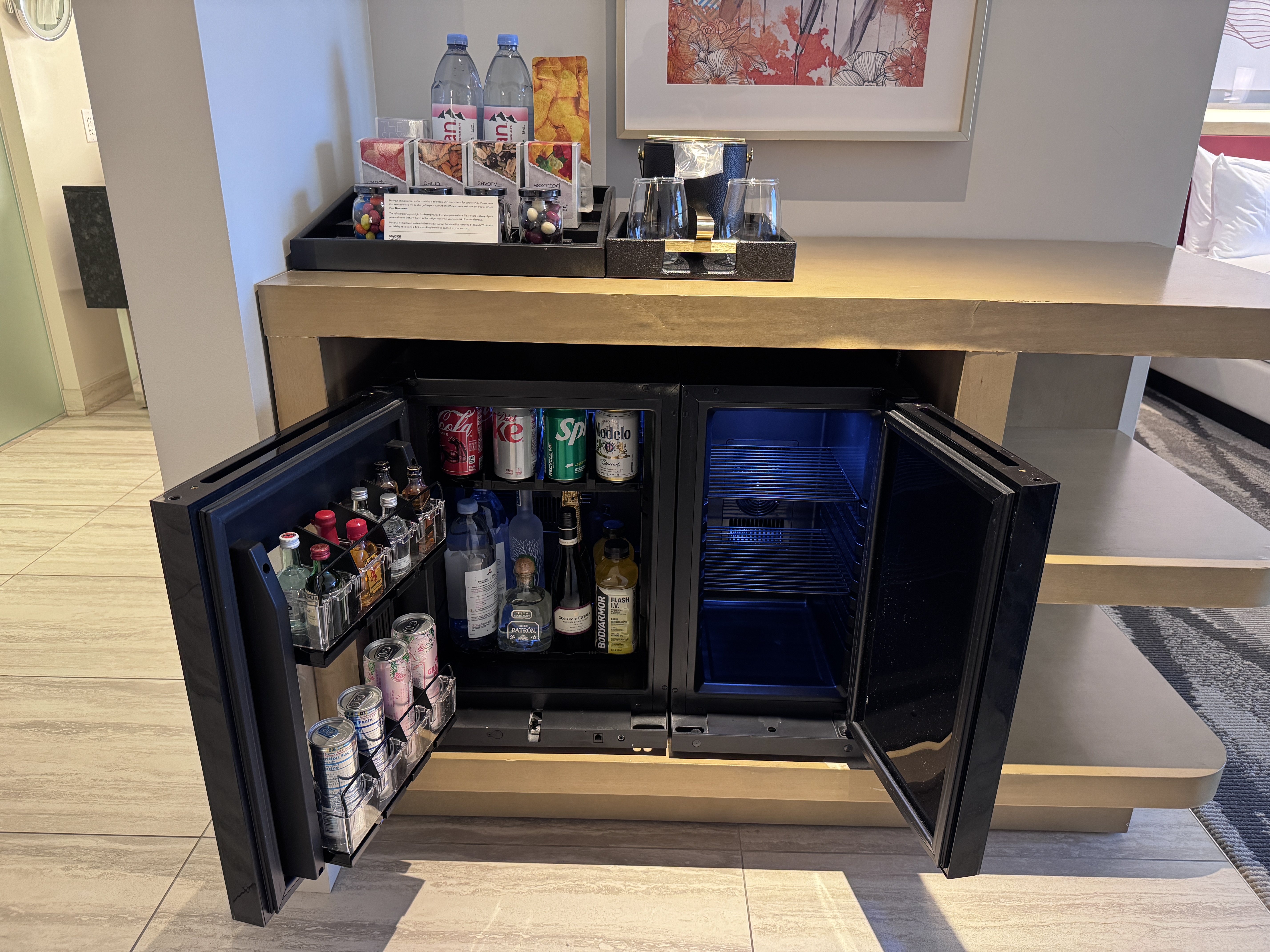 Conrad Las Vegas king room open minibar stocked with drinks and liquor