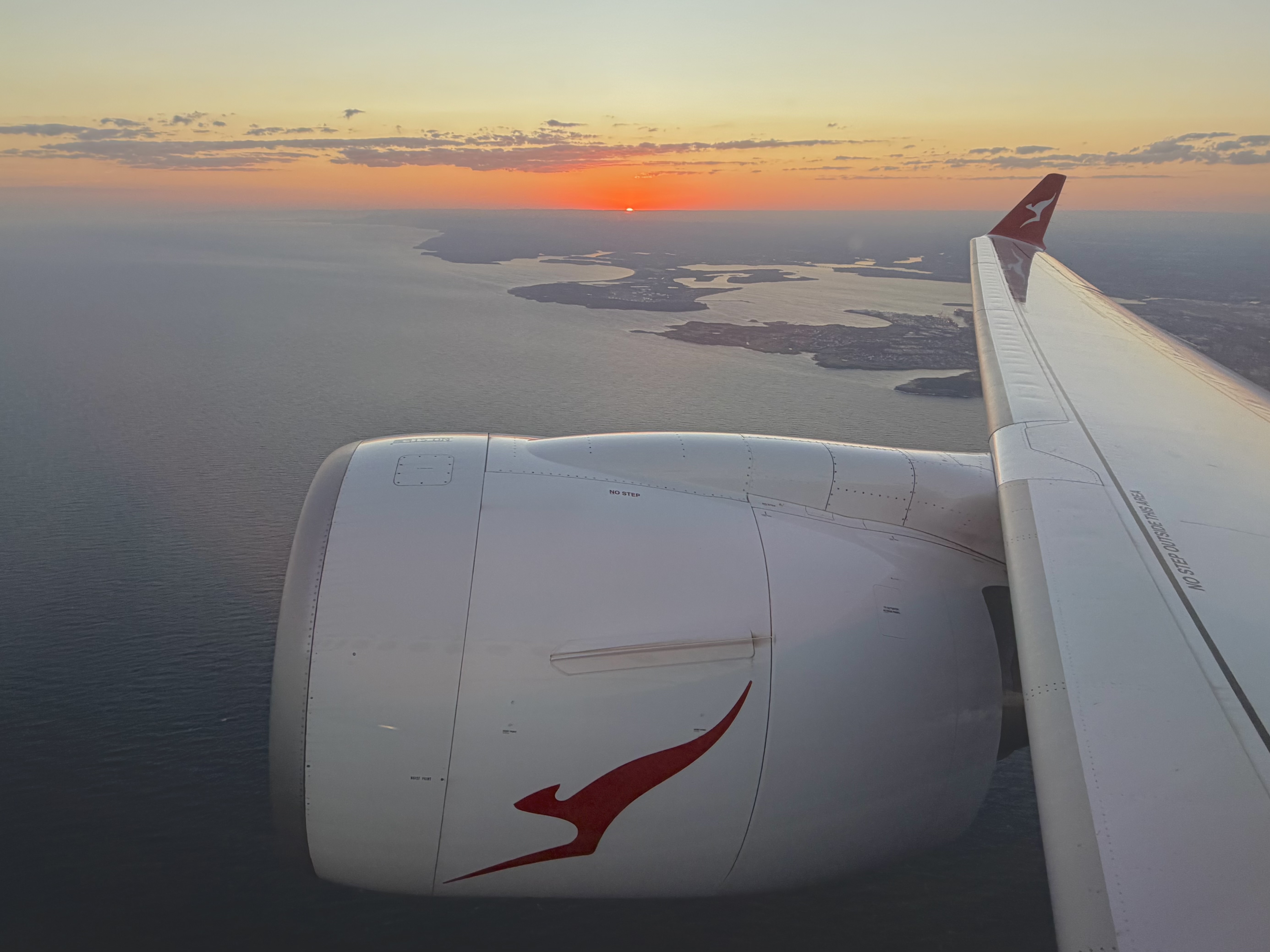 Qantas Airbus A220 wing and engine on take off from Sydney SYD