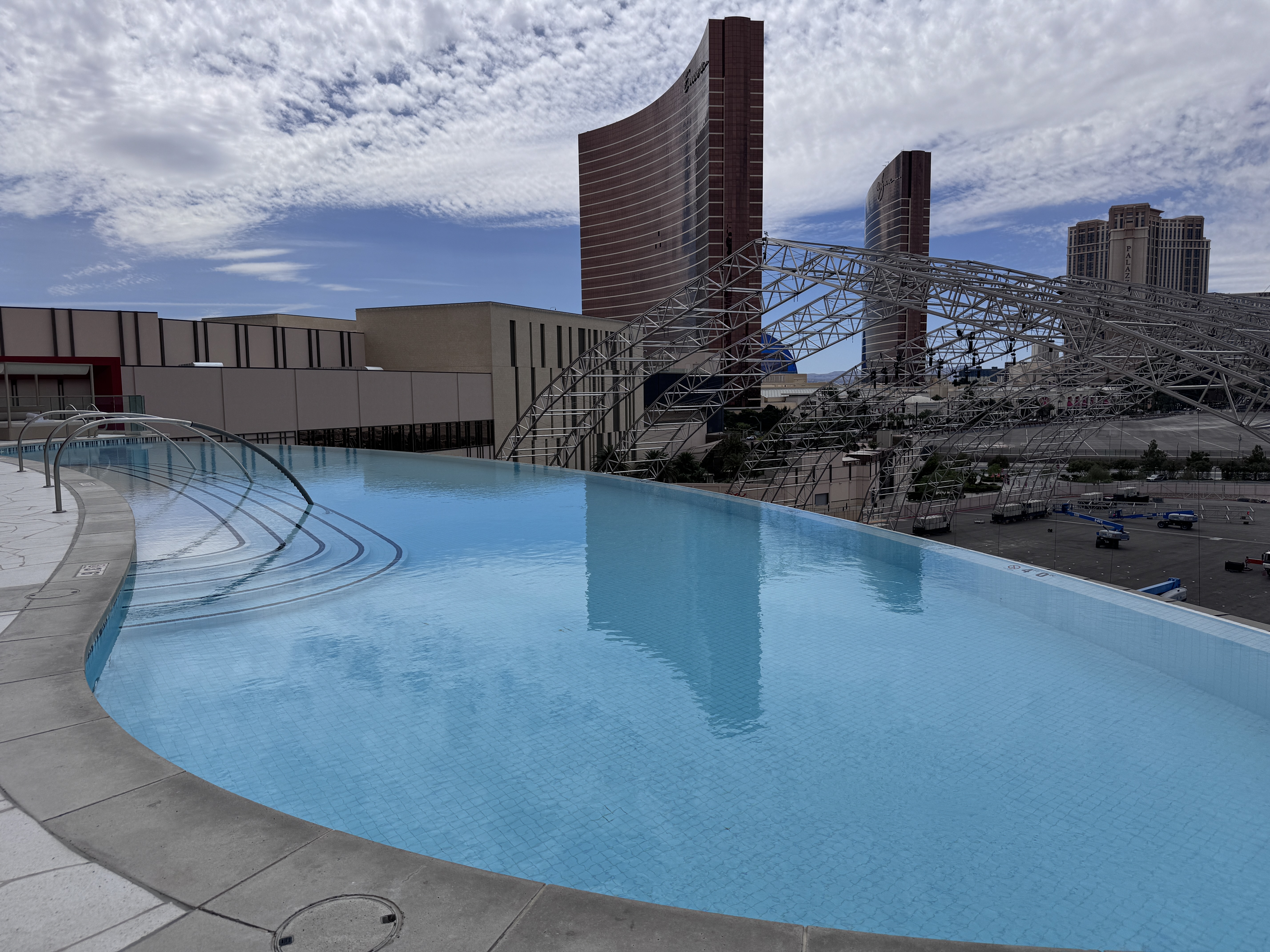 Resorts World Las Vegas Athena Infinity Pool wide angle with Encore towers