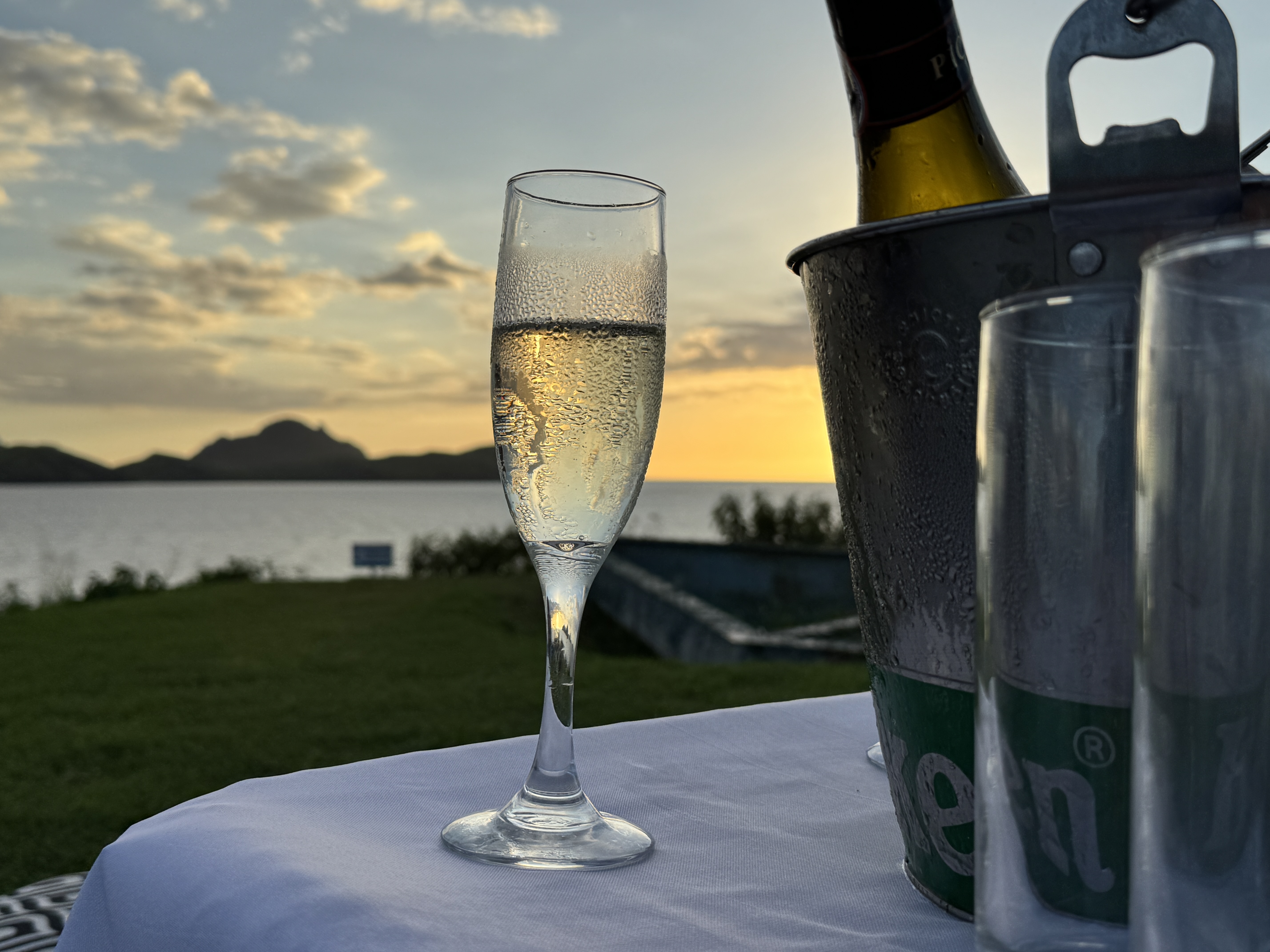 Sheraton Tokoriki Island Champagne flute ice bucket at sunset over the ocean