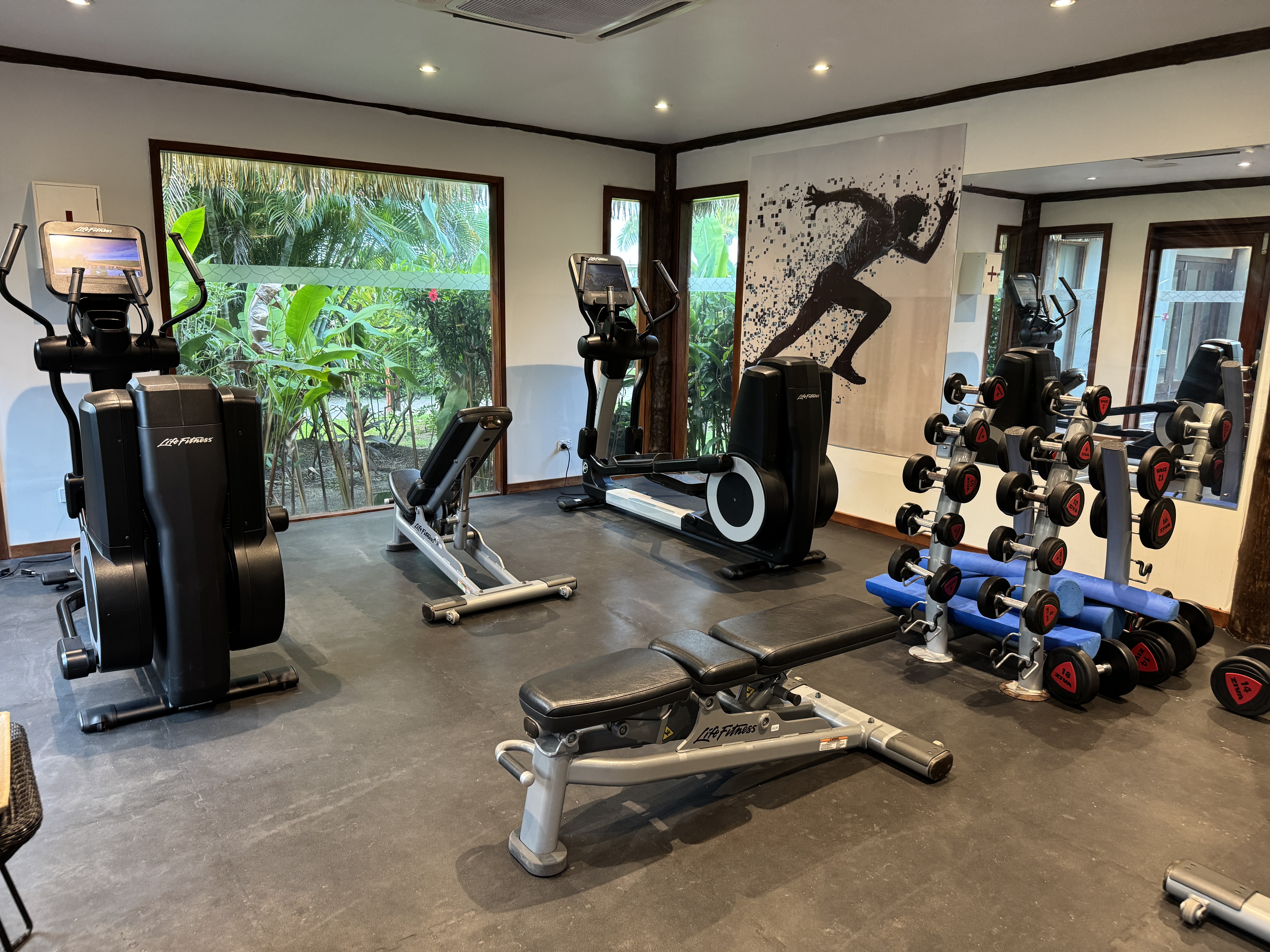 Sheraton Tokoriki Island Fitness center with cardio machines dumbbell rack