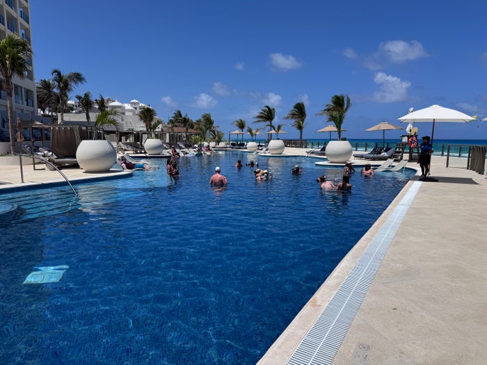 hyatt-zilara-cancun-pool-guests-swimming Hyatt Zilara Cancun Pool Guests Swimming
