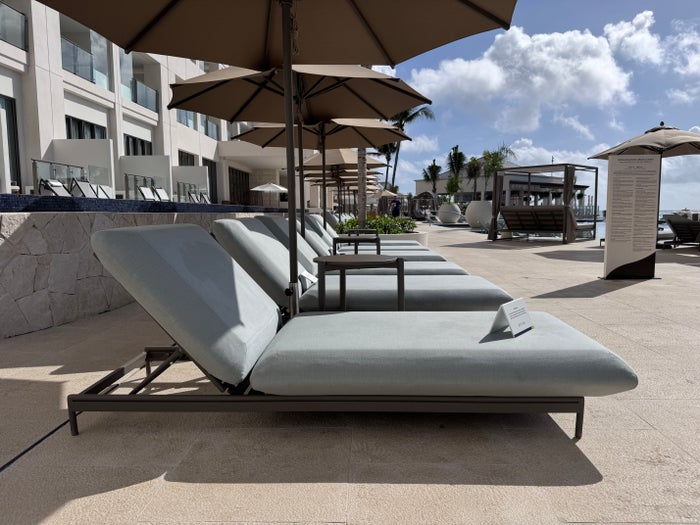 hyatt-zilara-cancun-poolside-loungers-umbrellas-row Hyatt Zilara Cancun Poolside Loungers Umbrellas Row