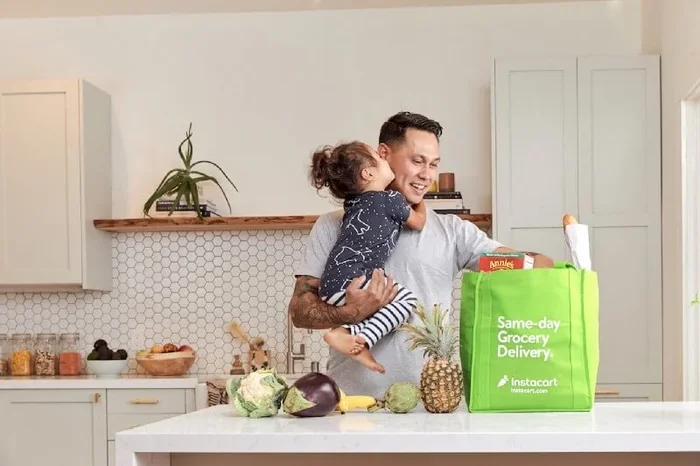 Instacart dad unpacking groceries