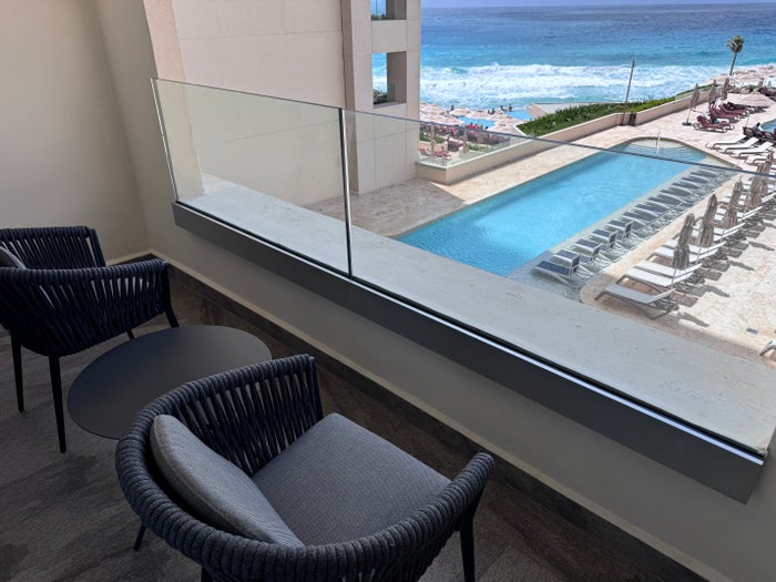 secrets-mirabel-cancun-balcony-seating-pool-view Secrets Mirabel Cancun Balcony Seating Pool View