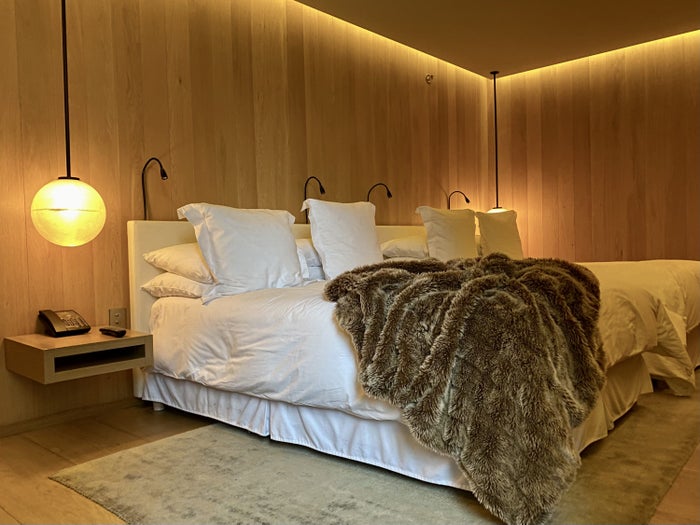 The Miami Beach EDITION empty modern pool Marriott The London EDITION beds by night