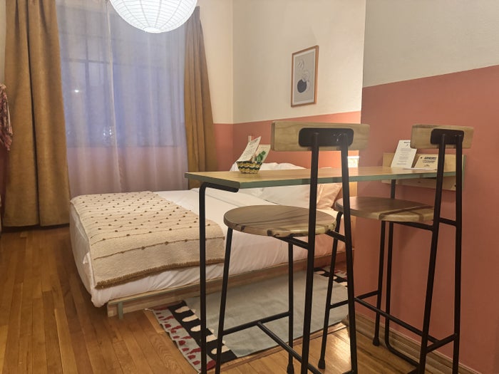 hotel-san-fernando-bunkhouse-bedroom-table-and-bed Hotel San Fernando Bunkhouse Bedroom Table and Bed