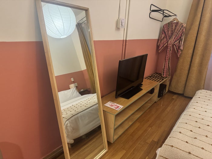 hotel-san-fernando-bunkhouse-bedroom-tv-and-mirror Hotel San Fernando Bunkhouse Bedroom TV and Mirror