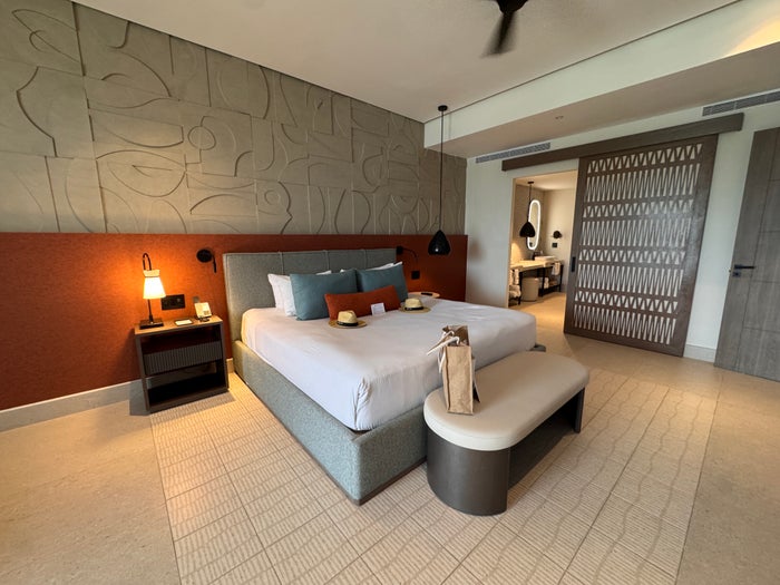 zemi-miches-king-bed-and-bathroom-door Zemi Miches king bed and bathroom door