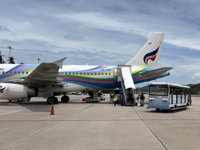 Bangkok Airways airplane and trolley Bangkok Airways airplane and trolley