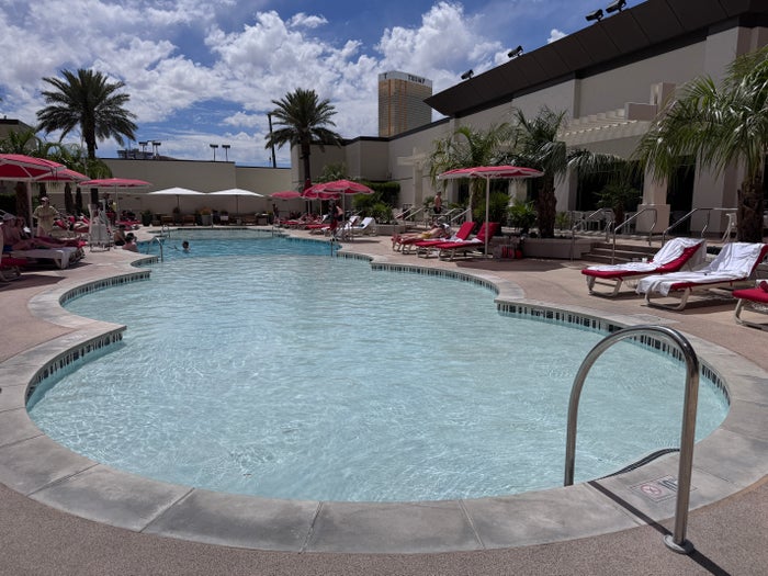 Resorts World Las Vegas pool smaller quiet pool with lounge chairs